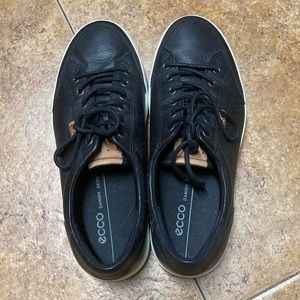 Elegant comfy black men’s sneakers. Nice enough to dress up. Worn once.